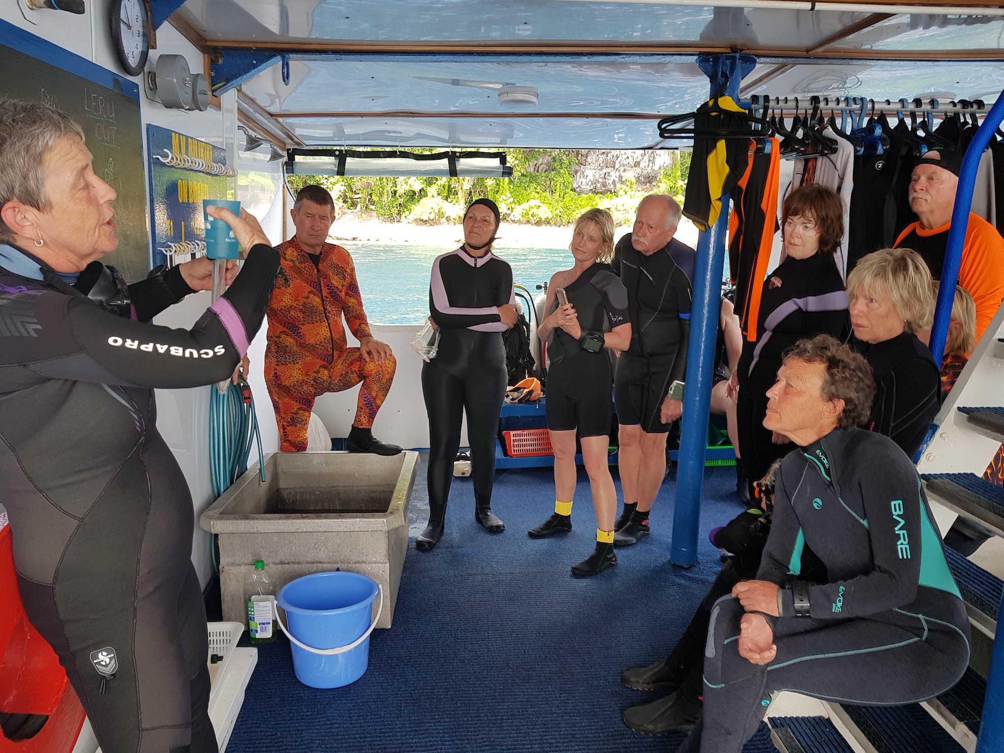 Listening to a dive briefing onboard the Bilikiki, Solomon Islands